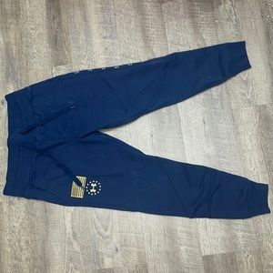 Under Armour sweat pants. Navy blue. Worn maybe once. Great condition.